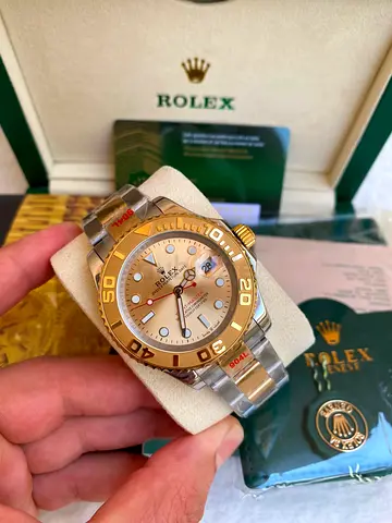 This appears to be a Rolex Yacht-Master 40 with a chocolate dial and a steel and rose gold (Everose