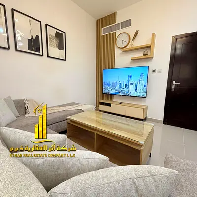 First occupancy, luxurious and elegant two-bedroom apartment with a fully furnished VIP-style living room, available for monthly rent in Ajman Cornich