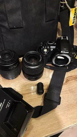 Nikon DSLR camera body with two lenses and accessories - used set