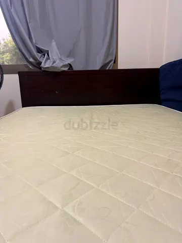 Wooden double bed frame with three queen size mattress - good condition