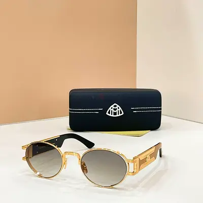 Maybach Gold-frame designer sunglasses with gradient lenses and case