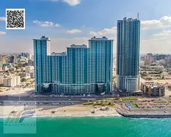 For annual rent | One bedroom and living room in Corniche Tower | Ajman – Prime location and high-