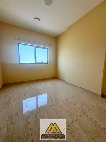 2BR apartment for rent in Al Jurf 3, second tenant, central AC, wardrobes, large space, AED 37,997/year.