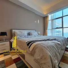Luxurious one-bedroom apartment in Ajman - Al Rashidiya 1 - Gulfa Tower - furnished with hotel-style