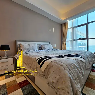 Luxurious one-bedroom apartment in Ajman - Al Rashidiya 1 - Gulfa Tower - furnished with hotel-style furniture for monthly rent