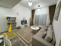 Luxury one-bedroom apartment in Ajman - Al Nuaimiya 1 - Al Shurooq Towers - furnished with hotel-sty