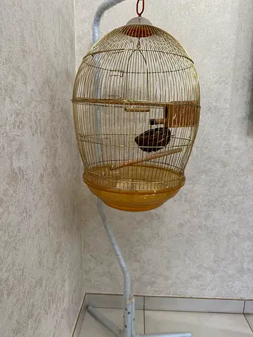 Round metal bird cage with stand — good condition