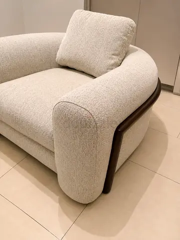 Brand New Modern Curved Ivory Fabric Armchair with Dark Wood Accents