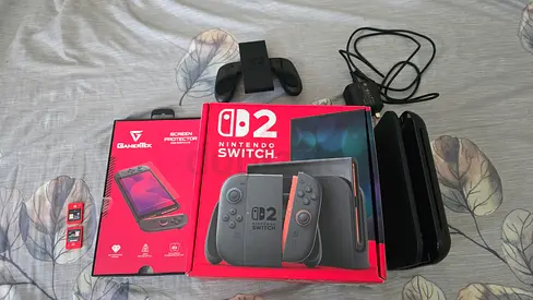Nintendo Switch 2 OLED - Excellent Condition with Games & Extras