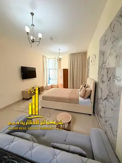 For monthly rent in Ajman - Studio apartment semi-detached kitchen, open view, fully furnished new w