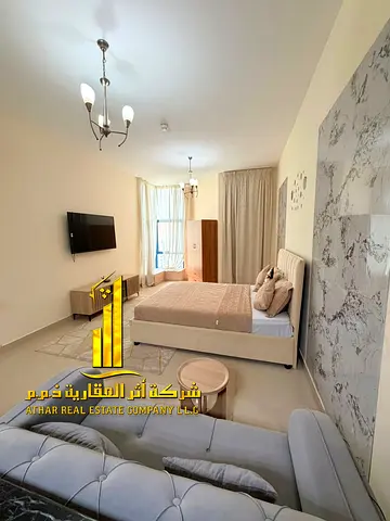 For monthly rent in Ajman - Studio apartment semi-detached kitchen, open view, fully furnished new with elegant furniture and a fully equipped kitchen
