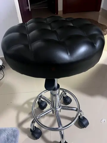 Adjustable Black Padded Bar Stool on Wheels