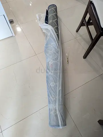 Light grey patterned area rug - rolled, Laundry cleaned and packed. Size 200 * 150 cm