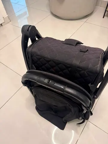 Compact foldable pram stroller - single seat, black. Airline friendly compact fold.