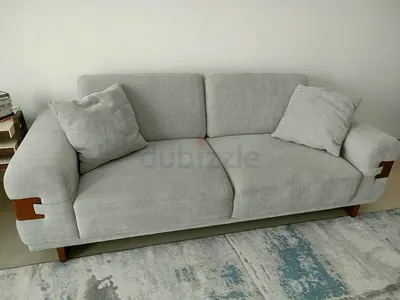 Light gray, three-seater fabric sofa bed@£ wood details – from Pan Home