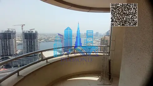 For annual rent: A two-bedroom apartment with a living room, featuring an open water view overlooking the Emirate of Ajman, located in Horizon Towers.