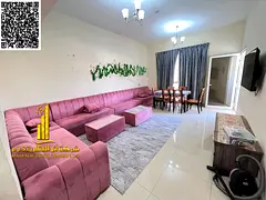 For monthly rent in Ajman, two-bedroom apartment with a balcony open view, fully furnished new with 