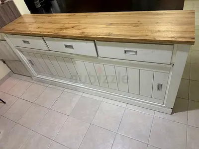 Over 7 ft long Wooden Sideboard with Three Drawers and Sliding Doors.