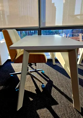 White modern office desk with angled legs - good condition