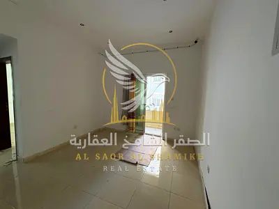 A spacious one-bedroom apartment with a living room and balcony in Al Qulaya featuring central air conditioning and ready to move in finishes