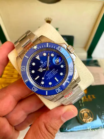 This is a Rolex Submariner Date "Smurf" (Ref. LB), featuring a 40mm white gold case and a distinct