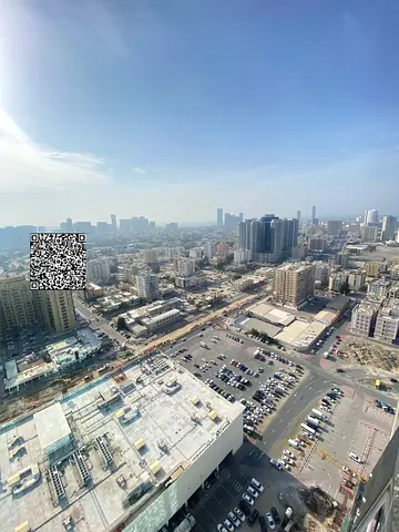 Excellent 1-bedroom apartment for sale in Al Waha Towers, 880 sq.ft, high floor, open city view, parking, swimming pool and gym. Vacant and ready for