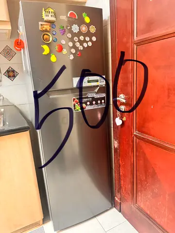 Used Silver Double-Door Refrigerator - Good Working Condition. 198 liters