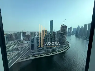 Premium 1BR | Fully Furnished | Stunning Burj & Canal Views