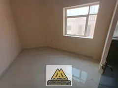 1BR in Al Alia, new building, 2 baths, central AC, near services and Dubai & Sharjah exits, AED 27,9