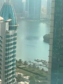 For rent in Al Majaz 1: 3-bedroom apartment with living room and lake view, AC by owner, gym, pool, 