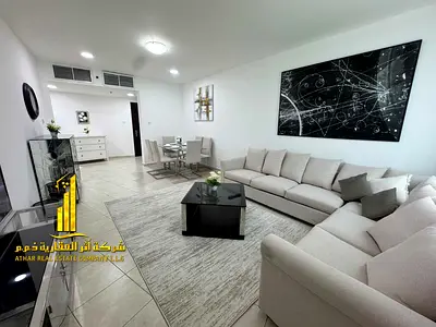 Beautiful two-bedroom apartment with an open view in Ajman - Corniche - next to Diwan Towers - furnished, available for monthly rent