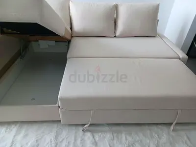 Comfortable Beige L-Shaped Sofa Bed with Storage