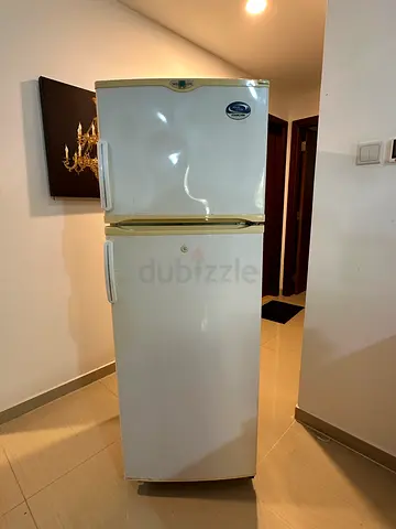 Used Nikai White Two-Door Refrigerator - Good Working Condition , 220 Litre