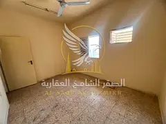 Two bedroom apartment with a living room for single men in Abu Shagara available for annual rent Spa