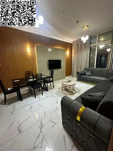 For rent in Ajman, Al Rashidiya – Al Waha Towers: Two bedrooms and a living room; all bills included. Amenities include a gym, swimming pool, and park