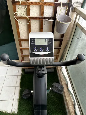 Used upright exercise bike with LCD console - good condition