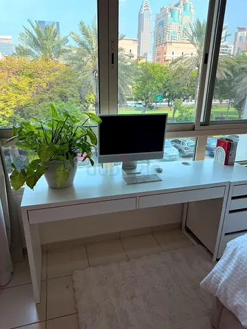 Micke IKEA Desk with 2 drawers 
Selling Dhs 250
Please what'sup +971581980676

Extra long 142cm top,