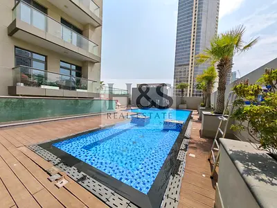 Spacious 1BHK | Pool View | Modern Living