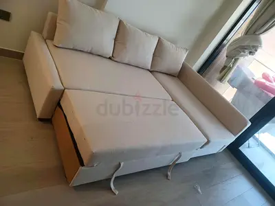 Comfortable Beige L-Shaped Sofa Bed with Pull Out Function