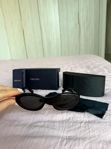 Prada black oval sunglasses with case