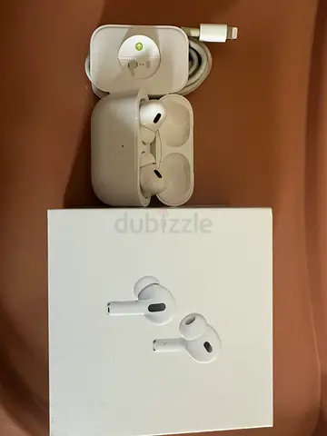 Apple AirPods Pro (2nd gen) with charging case and original box — Good condition