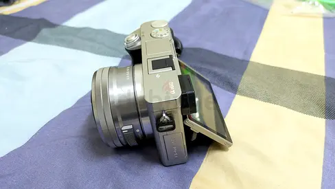 Sony Alpha 6000 mirrorless camera with  16-50mm lens and original battery