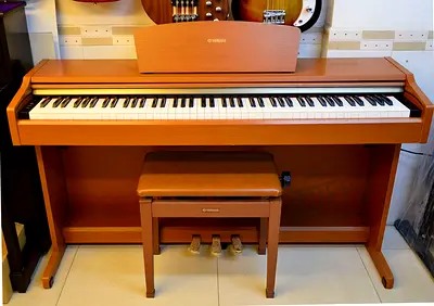 Yamaha Clavinova CLP130C with piano bench. Perfect working. Cash on delivery with  warranty.