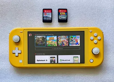 Nintendo Switch Lite, Yellow with 2 Games