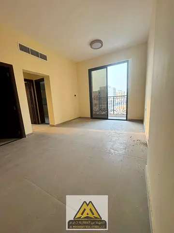 New 1BR in Al Jurf 3, 2 baths, balcony, family building, ready in 10 days, AED 34,997/year, 6 payments.