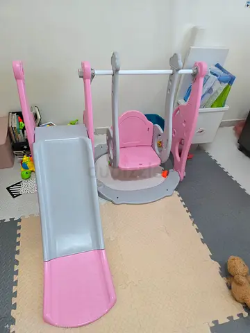 Kids indoor swing and slide set — pink plastic, good condition