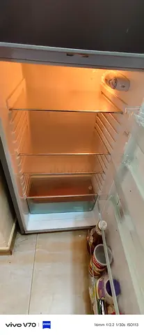 Used refrigerator in working condition - compact fridge