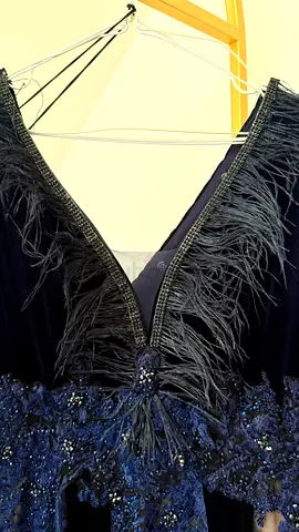Navy blue embellished evening dress with feather trim (size unknown)