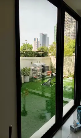 Black Aluminum Sliding Patio Door with Large Glass Panels