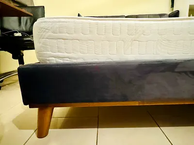 QUEEN SIZED BED WITH PADDED HEAD BOARD WITH MATTRESS